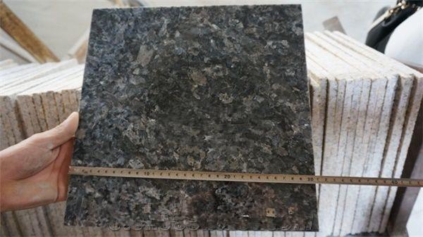 silver pearl granite tile inspecting